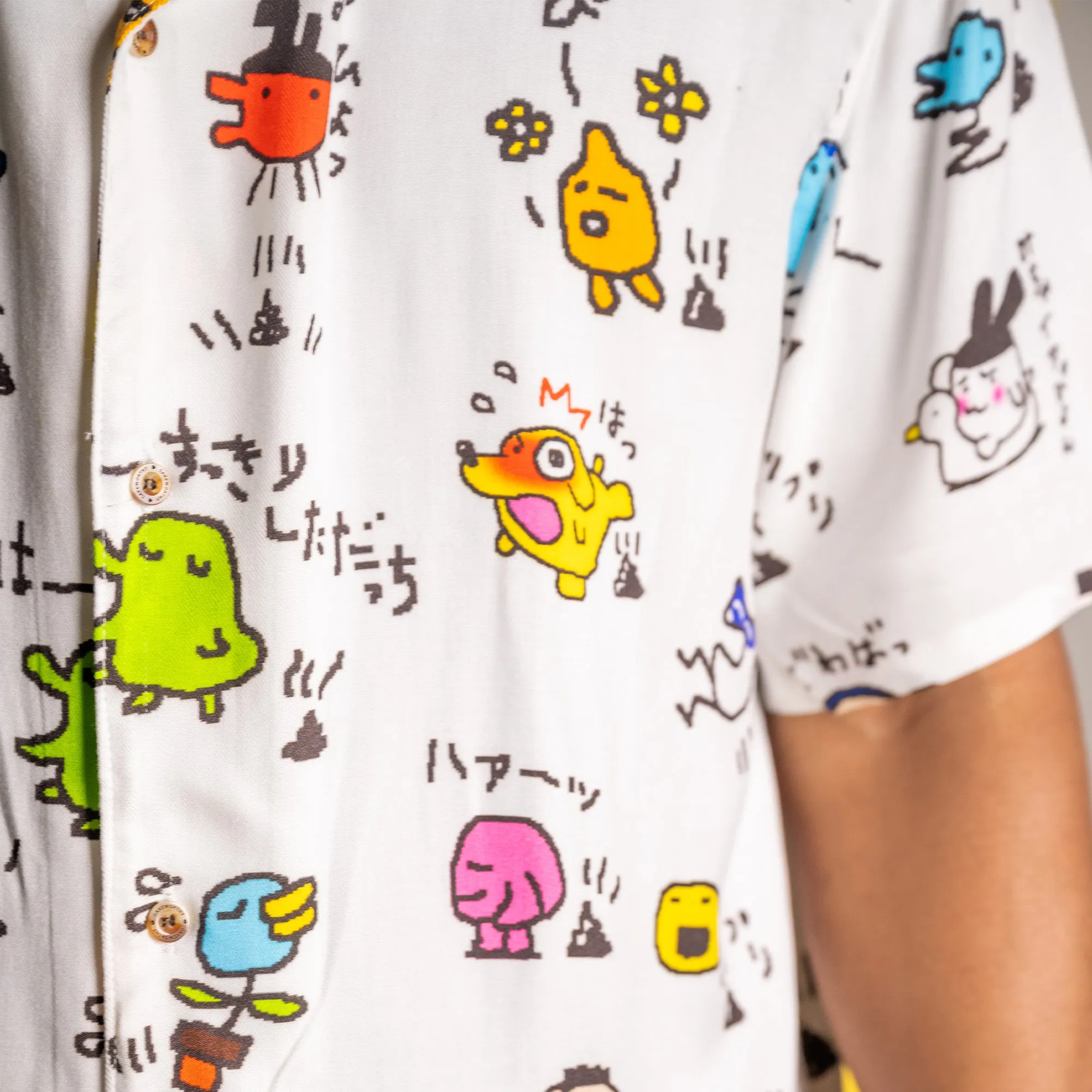 Charming Tamagotchi-Inspired Button-Up Shirt for Nostalgic Fans